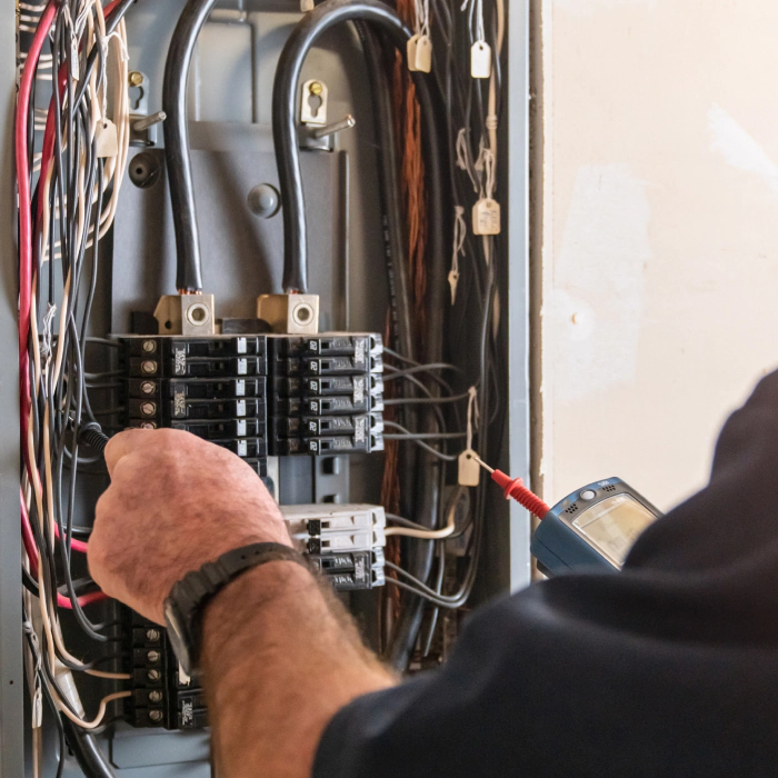 electrician doing an electrical panel replacement